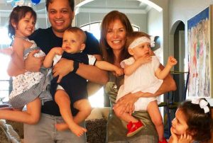 Jan and Panache Desai with their four children at a birthday celebration | JanDesai.com