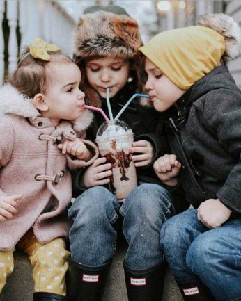 kids wearing hunter boots drinking milkshake | JanDesai.com